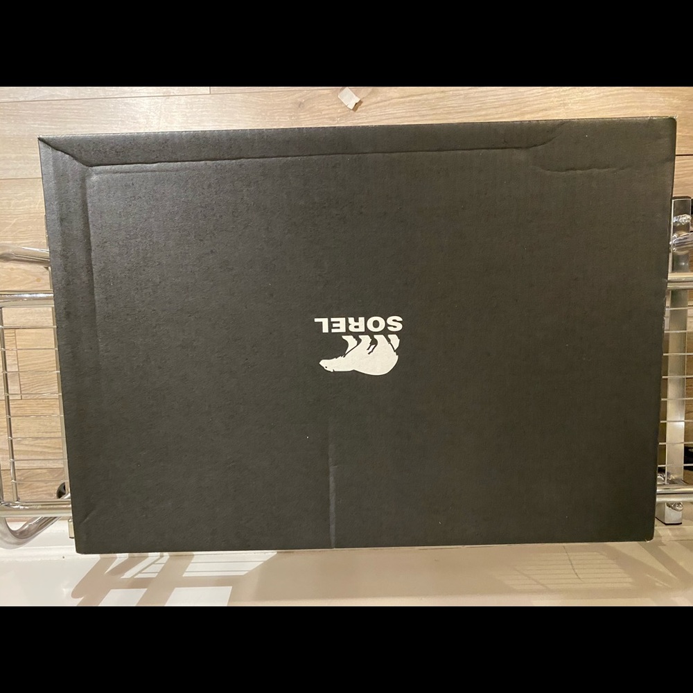 Sorel wedge Rain boots. New with box.